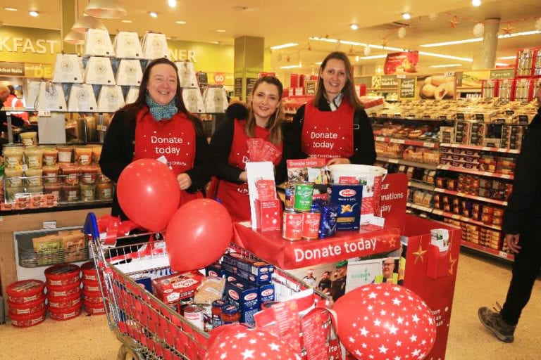 volunteer trio in store