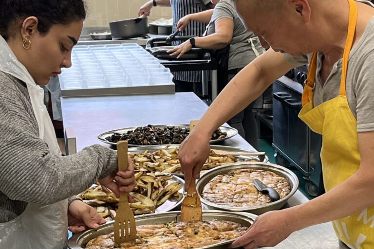 Volunteers preparing food