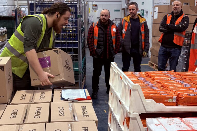 N Brown volunteers receiving safety briefing at FareShare Greater Manchester