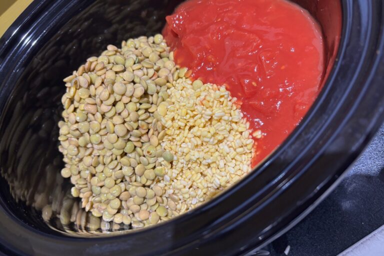 uncooked green lentils, yellow split peas & tinned tomatoes in a slow cooker