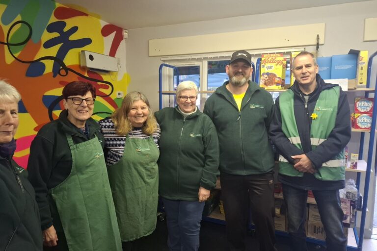 volunteers from Cedar Park Pantry smiling for the camera