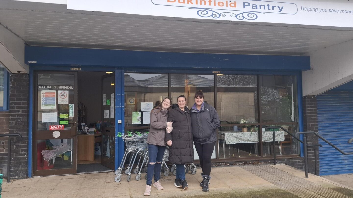 three volunteers from Dukinfield Pantry, outside the front of the building