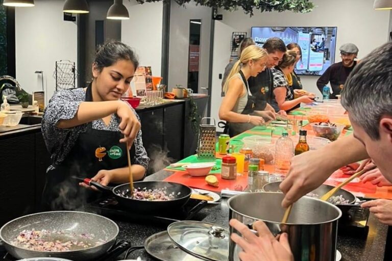 community cooking project in a large open plan restaurant kitchen